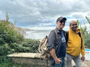 John Downer and M. V. Ramana stand in front of the Welsh coast